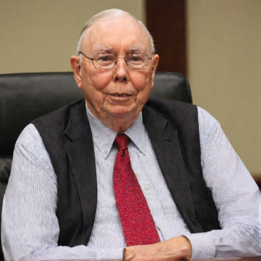 Charlie Munger in a meeting room