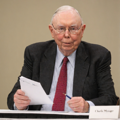 Charlie Munger taking notes