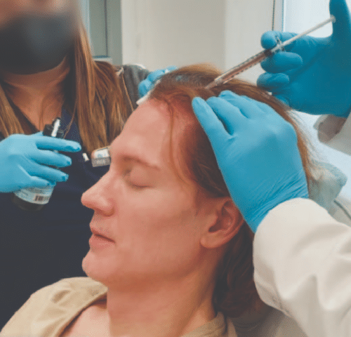 Bryan Johnson getting hair serum