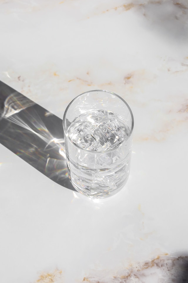 A glass of water representing Gary Brecka's early morning hydration