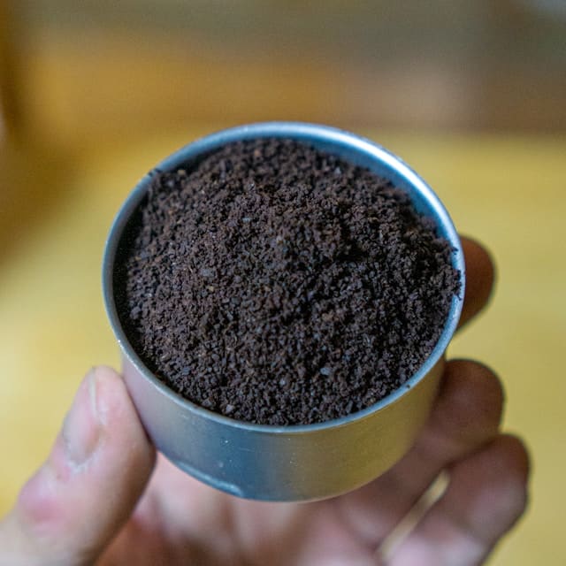 Jay Cutler holding his pre-workout powder