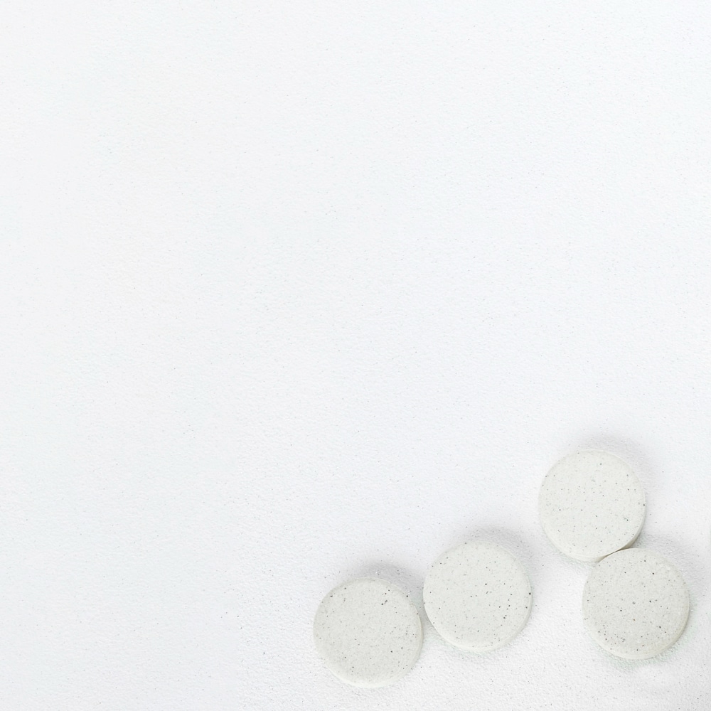Four NMN supplement pills