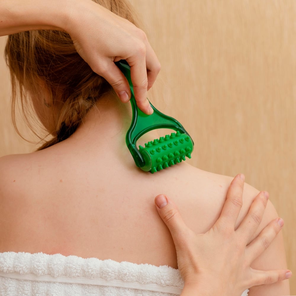 A girl following a sample Gua Sha routine