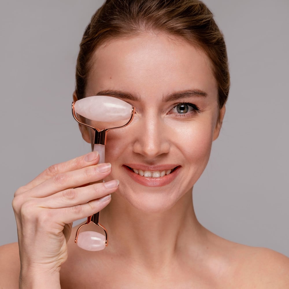 A girl focusing on a specific Gua Sha routine technique